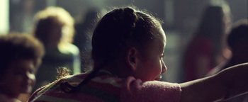 Movie still from “Harry Styles - Kiwi” (2017), directed by Us – Close Up shot, Over the shoulder angle