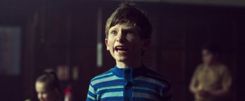 Movie still from “Harry Styles - Kiwi” (2017), directed by Us – Close Up shot, Low angle