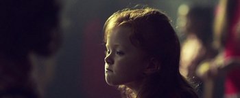 Movie still from “Harry Styles - Kiwi” (2017), directed by Us – Close Up shot, Over the shoulder angle