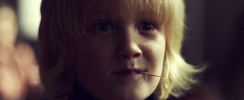 Movie still from “Harry Styles - Kiwi” (2017), directed by Us – Extreme Close Up shot, Low angle