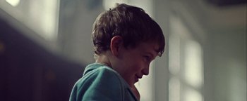 Movie still from “Harry Styles - Kiwi” (2017), directed by Us – Close Up shot, Over the shoulder angle