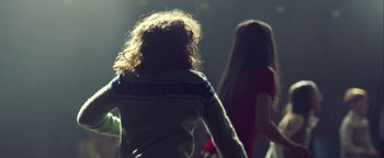 Movie still from “Harry Styles - Kiwi” (2017), directed by Us – Medium shot, Low angle