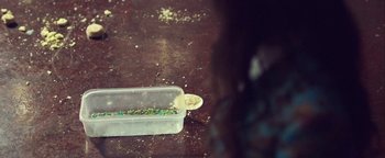 Movie still from “Harry Styles - Kiwi” (2017), directed by Us – Extreme Close Up shot, Overhead angle