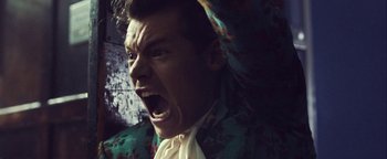 Movie still from “Harry Styles - Kiwi” (2017), directed by Us – Extreme Close Up shot, Low angle