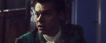 Movie still from “Harry Styles - Kiwi” (2017), directed by Us – Close Up shot, Over the shoulder angle