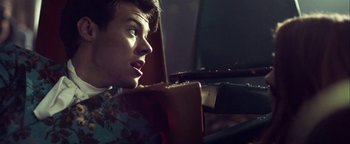 Movie still from “Harry Styles - Kiwi” (2017), directed by Us – Close Up shot, Over the shoulder angle