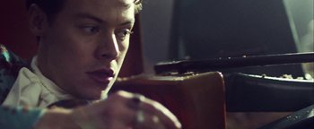 Movie still from “Harry Styles - Kiwi” (2017), directed by Us – Extreme Close Up shot, Over the shoulder angle