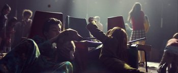 Movie still from “Harry Styles - Kiwi” (2017), directed by Us – Medium shot, High angle