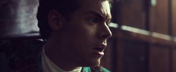 Movie still from “Harry Styles - Kiwi” (2017), directed by Us – Close Up shot, Over the shoulder angle