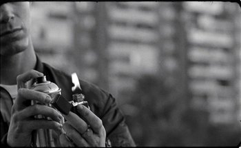 Movie still from “C.Tangana - Caballo Ganador” (2017), directed by Diana Kunst – Extreme Close Up shot, Low angle