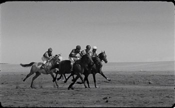 Movie still from “C.Tangana - Caballo Ganador” (2017), directed by Diana Kunst – Wide shot, Low angle