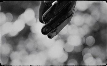 Movie still from “C.Tangana - Caballo Ganador” (2017), directed by Diana Kunst – Extreme Close Up shot, Low angle