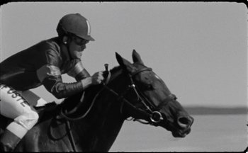 Movie still from “C.Tangana - Caballo Ganador” (2017), directed by Diana Kunst – Medium shot, Low angle