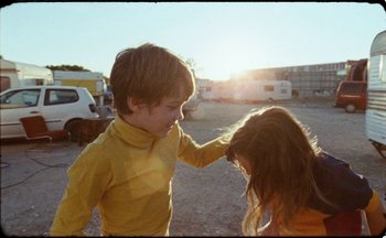 Movie still from “C.Tangana - Caballo Ganador” (2017), directed by Diana Kunst – Medium shot, Low angle