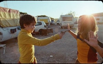 Movie still from “C.Tangana - Caballo Ganador” (2017), directed by Diana Kunst – Medium shot, Low angle