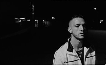 Movie still from “C.Tangana - Caballo Ganador” (2017), directed by Diana Kunst – Close Up shot, Low angle