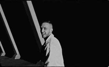 Movie still from “C.Tangana - Caballo Ganador” (2017), directed by Diana Kunst – Medium shot, Low angle