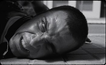 Movie still from “C.Tangana - Caballo Ganador” (2017), directed by Diana Kunst – Extreme Close Up shot, Overhead angle