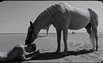 Movie still from “C.Tangana - Caballo Ganador” (2017), directed by Diana Kunst – Wide shot, Low angle