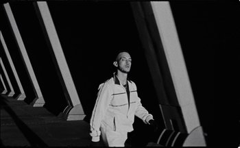 Movie still from “C.Tangana - Caballo Ganador” (2017), directed by Diana Kunst – Medium shot, Low angle