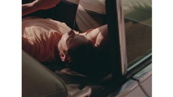 Movie still from “No World - Living Inc.” (2017), directed by Young Replicant – Extreme Close Up shot, High angle