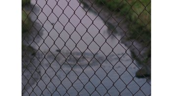 Movie still from “No World - Living Inc.” (2017), directed by Young Replicant – Extreme Close Up shot, High angle