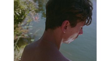 Movie still from “No World - Living Inc.” (2017), directed by Young Replicant – Close Up shot, High angle