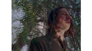 Movie still from “No World - Living Inc.” (2017), directed by Young Replicant – Close Up shot, Low angle