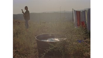 Movie still from “No World - Living Inc.” (2017), directed by Young Replicant – Extreme Wide shot, Low angle