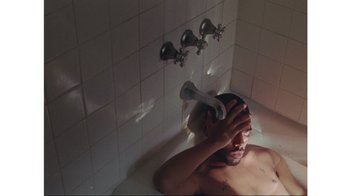 Movie still from “No World - Living Inc.” (2017), directed by Young Replicant – Medium shot, High angle