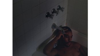 Movie still from “No World - Living Inc.” (2017), directed by Young Replicant – Medium shot, Overhead angle