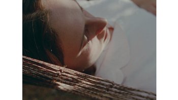 Movie still from “No World - Living Inc.” (2017), directed by Young Replicant – Extreme Close Up shot, Overhead angle