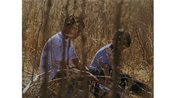 Movie still from “No World - Living Inc.” (2017), directed by Young Replicant – Medium shot, High angle