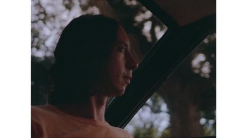 Movie still from “No World - Living Inc.” (2017), directed by Young Replicant – Close Up shot, Low angle