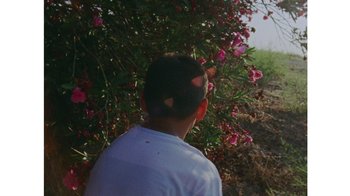 Movie still from “No World - Living Inc.” (2017), directed by Young Replicant – Extreme Close Up shot, High angle