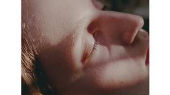 Movie still from “No World - Living Inc.” (2017), directed by Young Replicant – Extreme Close Up shot, Overhead angle