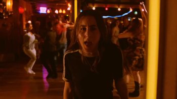 Movie still from “HAIM - Little of Your Love” (2017), directed by Paul Thomas Anderson – Medium shot, Low angle