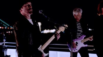 Movie still from “U2 - You’re The Best Thing About Me” (2017), directed by Jonas Åkerlund – Medium shot, Low angle