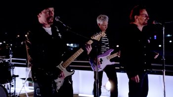 Movie still from “U2 - You’re The Best Thing About Me” (2017), directed by Jonas Åkerlund – Medium shot, Low angle