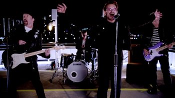 Movie still from “U2 - You’re The Best Thing About Me” (2017), directed by Jonas Åkerlund – Medium shot, Low angle