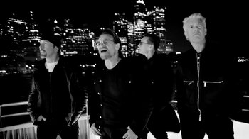 Movie still from “U2 - You’re The Best Thing About Me” (2017), directed by Jonas Åkerlund – Medium shot, Low angle