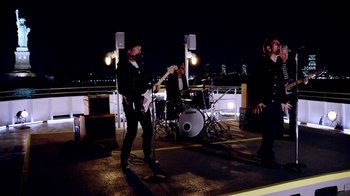 Movie still from “U2 - You’re The Best Thing About Me” (2017), directed by Jonas Åkerlund – Wide shot, Low angle