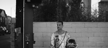 Movie still from “Depeche Mode - Cover Me” (2017), directed by Anton Corbijn – Medium shot, Low angle