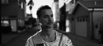 Movie still from “Depeche Mode - Cover Me” (2017), directed by Anton Corbijn – Close Up shot, Low angle