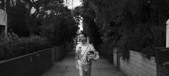 Movie still from “Depeche Mode - Cover Me” (2017), directed by Anton Corbijn – Medium shot, High angle