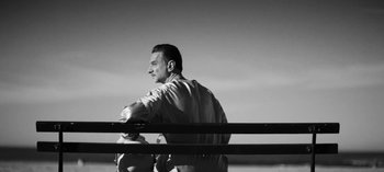 Movie still from “Depeche Mode - Cover Me” (2017), directed by Anton Corbijn – Medium shot, Low angle