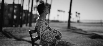 Movie still from “Depeche Mode - Cover Me” (2017), directed by Anton Corbijn – Medium shot, Low angle