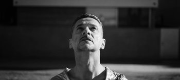 Movie still from “Depeche Mode - Cover Me” (2017), directed by Anton Corbijn – Close Up shot, Low angle