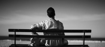 Movie still from “Depeche Mode - Cover Me” (2017), directed by Anton Corbijn – Medium shot, Low angle