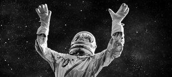 Movie still from “Depeche Mode - Cover Me” (2017), directed by Anton Corbijn – Medium shot, Low angle